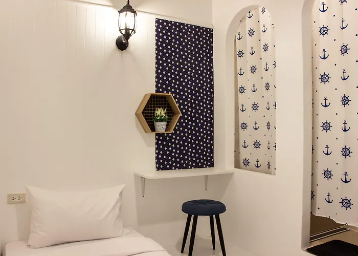 โรงแรม The Bed Boutique House *